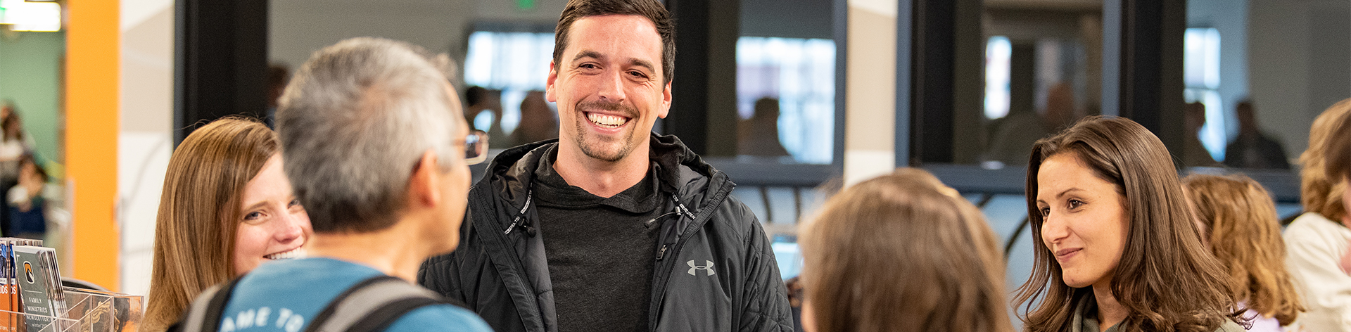 Smiling people in lobby of a church