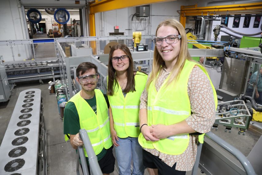 Students at engineering plant.