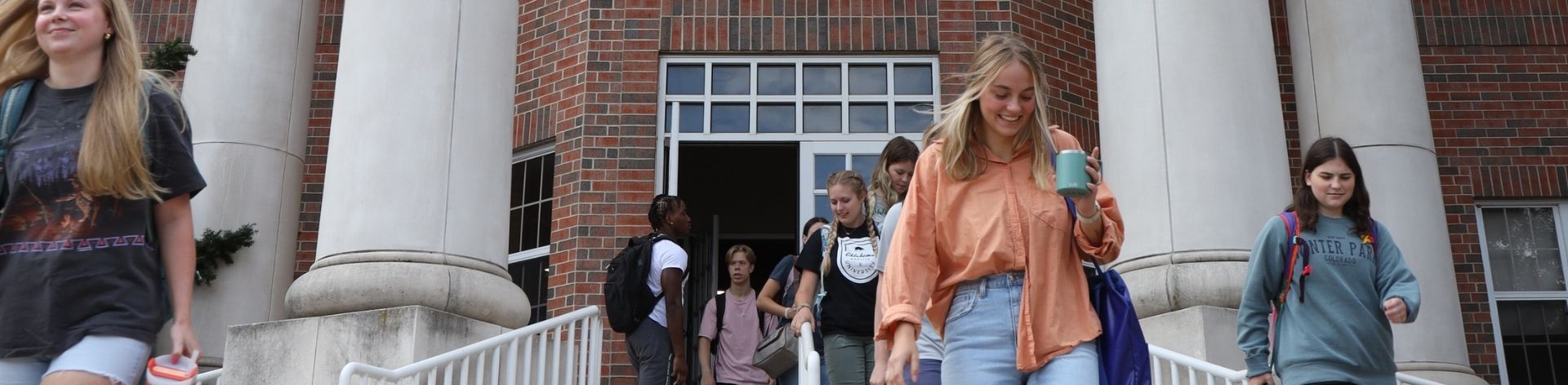 Students exiting a school building.